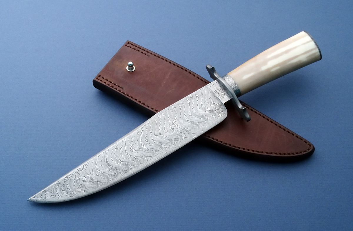 Mike Ruth's Custom Forged Damascus Bowie is here.