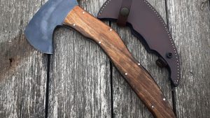 Nebojsa Stanacev of Serbia forged this hatchet hamon tactical camp knife