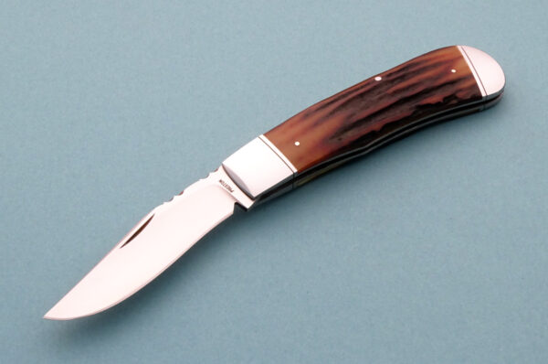 Rusty Preston Custom Trapper Slip Joint Folding Knife with Amber Stag and Filework.