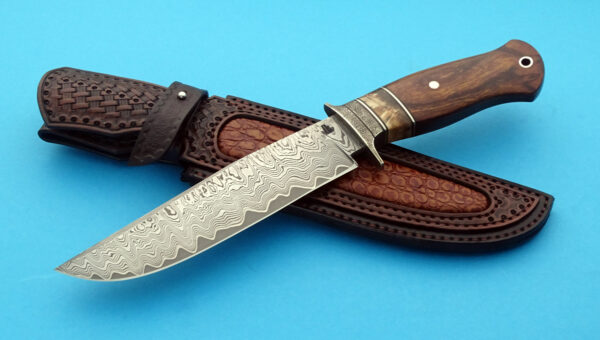 Maksim Tjulpin forged San Mai Damascus Fighter decorative leather sheath by maker. Made in Latvia.
