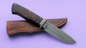 Bob Earhart Custom Forged Turkish Twist Damascus Fram Handle Hunting Knife. A stunning knife both in construction and visual appeal. Bob is an ABS Journeyman Smith.