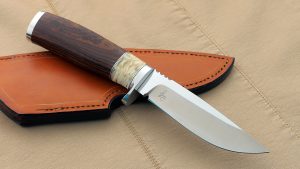 Custom made Canadian Hunter by Bob Lay nice grinds and Bocote wood handle with Musk Ox spacer
